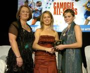 12 November 2005; Katie Power, right, from Kilkenny, who was presented with her Young Player of the Year nominee award by Elaine Burke, Cork captain, and Miriam O'Callaghan, left, President, Cumann Camogaiochta na nGael, at the 2005 Camogie All-Star Awards, in association with O'Neills. Citywest Hotel, Dublin. Picture credit: Brendan Moran / SPORTSFILE