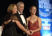 12 November 2005; Mary O'Connor, from Cork, who was presented with her award by Ossie Kilkenny, Chairperson, of the Irish Sports Council and Miriam O'Callaghan, left, President, Cumann Camogaiochta na nGael, at the 2005 Camogie All-Star Awards, in association with O'Neills. Citywest Hotel, Dublin. Picture credit: Ray McManus / SPORTSFILE