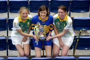 15 November 2005; Camogie players Mairin McAleenan, left, and Lisa McCrickard, Liatroim Fontenoys, with Marie O'Looney, centre, Newmarket-on-Fergus, at a photocall ahead of the All-Ireland camogie Senior and Junior club championship finals which will take place this Sunday, November 20th. St. Lachtain's and Davitts will contest the Senior final while Liatroim Fontenoys and Newmarket-on-Fergus will contest the Junior final. Croke Park, Dublin. Picture credit: Brian Lawless / SPORTSFILE