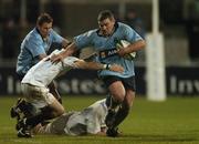 11 November 2005; Conor Geoghegan, UCD, is tackled by Francis Keane, Dublin University. AIB All Ireland League 2005-2006, Division 1, and University Colours Match, UCD v Dublin University, Donnybrook, Dublin. Picture credit: Matt Browne / SPORTSFILE