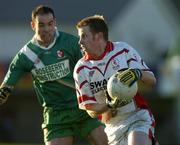 13 November 2005; Daniel Walker, Eire Og, in action against Dermot Earley, Sarsfields. Leinster Club Senior Football Championship Quarter-Final, Eire Og v Sarsfields, Dr. Cullen Park, Co. Carlow. Picture credit: Matt Browne / SPORTSFILE