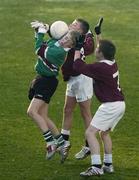 21 November 2005; Thomas O'Rourke, St. Philip’s, Clonsilla, in action against Scott Fulham and Gearoid Duff, (7), Scoil Maelruáin, Old Baw . Allianz Cumann na mBunscol Finals, Corn Mhic Chaoilte, Scoil Maelruáin, Old Bawn v St. Philip’s, Clonsilla, Croke Park, Dublin. Picture credit: Damien Eagers / SPORTSFILE