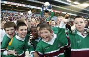 21 November 2005; St. Philip’s, Clonsilla players celebrate as captain Kieran Yeow lifts the Corn Mhic Chaoilte . Allianz Cumann na mBunscol Finals, Corn Mhic Chaoilte, Scoil Maelruáin, Old Bawn v St. Philip’s, Clonsilla, Croke Park, Dublin. Picture credit: Damien Eagers / SPORTSFILE