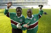 21 November 2005; Eric Kameni, left and Temi Raheem, St. Philip’s, Clonsilla celebrate victory. Allianz Cumann na mBunscol Finals, Corn Mhic Chaoilte, Scoil Maelruáin, Old Bawn v St. Philip’s, Clonsilla, Croke Park, Dublin. Picture credit: Damien Eagers / SPORTSFILE