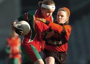 21 November 2005; Deirdre Murphy, St. Brigid’s, Castleknock, in action against Laren Falconer, Scoil Cholmcille, Knocklyon. Allianz Cumann na mBunscol Finals, Corn Austin Finn, St. Brigid’s, Castleknock v Scoil Cholmcille, Knocklyon, Croke Park, Dublin. Picture credit: David Levingstone / SPORTSFILE