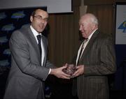 21 November 2005; The Association of Sports Journalists in Ireland, in association with Lucozade Sport, Ireland's leading sports drink, presented a celebration lunch to commemorate Ireland's famous win in the 1948 International Rugby Championship. At the lunch are Peter Harding,  Lucozade Sport, who presented  Karl Mullen with his award. Jury's Hotel, Ballsbridge, Dublin. Picture credit: Ray McManus / SPORTSFILE