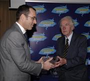 21 November 2005; The Association of Sports Journalists in Ireland, in association with Lucozade Sport, Ireland's leading sports drink, presented a celebration lunch to commemorate Ireland's famous win in the 1948 International Rugby Championship. At the lunch are Peter Harding,  Lucozade Sport, who presented Michael O'Flanagan with his award. Jury's Hotel, Ballsbridge, Dublin. Picture credit: Ray McManus / SPORTSFILE