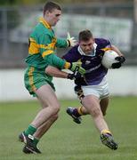 27 November 2005; Darren Magee, Kilmacud Crokes, in action against Niall McNamee, Rhode. Leinster Club Senior Football Championship Semi-Final, Kilmacud Crokes v Rhode, St. Conleth's Park, Newbridge, Co. Kildare. Picture credit: David Maher / SPORTSFILE