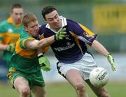 27 November 2005; Ray Cosgrave, Kilmacud Crokes, in action against Brian Darby, Rhode. Leinster Club Senior Football Championship Semi-Final, Kilmacud Crokes v Rhode, St. Conleth's Park, Newbridge, Co. Kildare. Picture credit: David Maher / SPORTSFILE