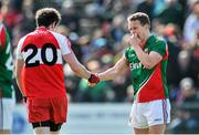 6 April 2014; Andy Moran, Mayo, shakes hands with Emmett Bradley, Derry after the game. Allianz Football League, Division 1, Round 7, Mayo v Derry, Elverys MacHale Park, Castlebar, Co. Mayo. Picture credit: Ray Ryan / SPORTSFILE