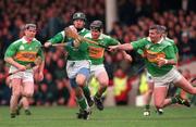 11 April 1999; Damien Quigley of Limerick in action against Séamus McIntyre of Kerry during the Church & General Hurling League Division 1 match between Limerick and Kerry at the Gaelic Grounds in Limerick. Photo by Aoife Rice/Sportsfile