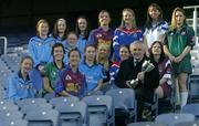 12 December 2005; An Taoiseach Bertie Ahern TD, was in Croke Park for a &quot;triple header&quot; with the CCIA, the Camogie Associations 3rd Level council. The day included the draws for the Ashbourne and Purcell Cup competitions, the launch of the associations &quot;Women in Sport&quot; project and the presentation of the first national camogie Bursary awards. Pictured with An Taoiseach Bertie Ahern, TD, are second level students involved in the Women in Sport project and the 10 3rd level bursery award winners, back from left, Oonagh O'Shaughnessy, Gillian Kearney, Amy Brennan, Katie Tyan, Anna Geary, UL, Trish O'Halloran, WIT, Sharon McMahon, Mary Immaculate College, Ennis, and Aoife Murray, LIT. Front, from left, Sarah Murreann, Laura Lavery, Queens, Jennifer O'Leary, UL, Grace McNamara, IT Tralee, Niamh Taylor, TCD, Lizzy Flynn, WIT and Denise Twomey, NUIG. Croke Park, Dublin. Picture credit: Brendan Moran / SPORTSFILE