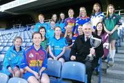12 December 2005; An Taoiseach Bertie Ahern TD, was in Croke Park for a &quot;triple header&quot; with the CCIA, the Camogie Associations 3rd Level council. The day included the draws for the Ashbourne and Purcell Cup competitions, the launch of the associations &quot;Women in Sport&quot; project and the presentation of the first national camogie Bursary awards. Pictured with An Taoiseach Bertie Ahern, TD, are second level students involved in the Women in Sport project and the 10 3rd level bursery award winners, back from left, Oonagh O'Shaughnessy, Gillian Kearney, Amy Brennan, Katie Tyan, Anna Geary, UL, Trish O'Halloran, WIT, Sharon McMahon, Mary Immaculate College, Ennis, and Aoife Murray, LIT. Front, from left, Sarah Murreann, Jennifer O'Leary, UL, Laura Lavery, Queens, Grace McNamara, IT Tralee, Niamh Taylor, TCD, Lizzy Flynn, WIT and Denise Twomey, NUIG. Croke Park, Dublin. Picture credit: Brendan Moran / SPORTSFILE