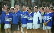 13 November 2005; The St. Senans Kilkee players stand for the National Anthem. Munster Club Senior Football Championship, Monaleen v St. Senans Kilkee, Gaelic Grounds, Limerick. Picture credit: Kieran Clancy / SPORTSFILE