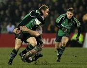 6 January 2006; Paul Warwick, Connacht, is tackled by Michael Owen, Newport Gwent Dragons. Celtic League 2005-2006, Group A, Newport Gwent Dragons v Connacht, Rodney Parade, Newport, Wales. Picture credit: Tim Parfitt / SPORTSFILE