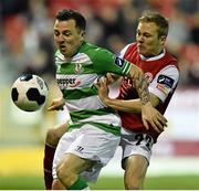 11 April 2014; Gary McCabe, Shamrock Rovers, in action against Conor McCormack, St Patrick's Athletic. Airtricity League Premier Division, St Patrick's Athletic v Shamrock Rovers, Richmond Park, Dublin. Picture credit: David Maher / SPORTSFILE