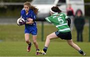 12 April 2014; Aoife Murray, Scoil Mhuire Carrick-On-Suir, in action against Tara Egan, Gallen CS Ferbane. Tesco HomeGrown Post Primary School Junior C, Gallen CS Ferbane, Co. Offaly v Scoil Mhuire Carrick-On-Suir, Co. Tipperary. Crettyard GAA, Crettyard, Co. Laois. Picture credit: Barry Cregg / SPORTSFILE