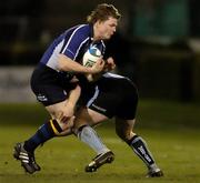 14 January 2006; Brian O'Driscoll, Leinster, is tackled by Scott Lawson, Glasgow Warriors. Heineken Cup 2005-2006, Pool 5, Round 5, Leinster v Glasgow Warriors, RDS, Dublin. Picture credit: Matt Browne / SPORTSFILE