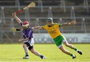 13 April 2014; Peter Coyne, Fingal, in action against Ciaran Mathewson, Donegal. Allianz Hurling League Roinn 2B 2014 Promotion / Relegation Final, Fingal v Donegal, Kingspan Breffni Park, Cavan. Picture credit: Oliver McVeigh / SPORTSFILE