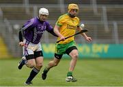 13 April 2014; Sean McVeigh, Donegal, in action against Rob Sheridan, Fingal. Allianz Hurling League Roinn 2B 2014 Promotion / Relegation Final, Fingal v Donegal, Kingspan Breffni Park, Cavan. Picture credit: Oliver McVeigh / SPORTSFILE