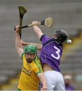 13 April 2014; Paddy Hannigan, Donegal, in action against Graham Morris, Fingal. Allianz Hurling League Roinn 2B 2014 Promotion / Relegation Final, Fingal v Donegal, Kingspan Breffni Park, Cavan. Picture credit: Oliver McVeigh / SPORTSFILE