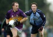 15 January 2006; Philip Wallace, Wexford, in action against Kevin Bonner, Dublin. O'Byrne Cup, Second Round, Dublin v Wexford, O'Toole's GAA Club, Ayrefield Park, Coolock, Dublin. Picture credit: Brian Lawless / SPORTSFILE