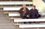 21 January 2006; Two race fans watch the I.N.H Stallion Owners EBF Maiden Hurdle. Naas Racecourse, Naas, Co. Kildare. Picture credit: Pat Murphy / SPORTSFILE