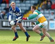 22 January 2006; Padraig Clancy, Laois, in action against Neville Coughlan, Offaly. O'Byrne Cup, Semi-Final, Laois v Offaly, O'Moore Park, Portlaoise, Co. Laois. Picture credit: David Maher / SPORTSFILE