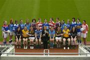 24 January 2006; Helen O'Rourke, Chief Executive, Ladies Gaelic Football Association, with students from various colleges, including, NUIG, UL, WIT, UCC, CIT, IT Tralee, QUB, IT Sligo, UUJ, UCD, NUI Maynooth, St Pat's Drumcondra, DCU and TCD, at the draw for the O'Connor, Lynch and Donaghy Cup and Shield competition, the top competitions for the third level institutions affiliated to the Higher Education council of the Ladies Gaelic Football Association and which will take place in Dundalk IT, from March 24-26. Croke Park, Dublin. Picture credit: Brendan Moran / SPORTSFILE