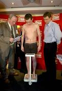 27 January 2006; Noel Wilders on the scales alongisde promoter Brian Peters, right, prior to his International Super Bantamweight bout against Bernard Dunne. Burlington Hotel, Dublin. Picture credit: Brendan Moran / SPORTSFILE