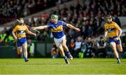 20 April 2014; James Woodcock, Tipperary, in action against Colin Ryan, Clare. Allianz Hurling League Division 1 semi-final, Clare v Tipperary, Gaelic Grounds, Limerick. Picture credit: Ray McManus / SPORTSFILE