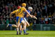 20 April 2014; Niall O'Meara, Tipperary, races clear of Jack Browne and Cian Dillon, Clare. Allianz Hurling League Division 1 semi-final, Clare v Tipperary, Gaelic Grounds, Limerick.  Picture credit: Ray McManus / SPORTSFILE