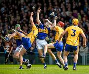 20 April 2014; Niall O'Meara, Tipperary, supported by team-mate John O'Dwyer, in action against Brendan Bugler, left, Jack Browne and Cian Dillon, right, Clare. Allianz Hurling League Division 1 semi-final, Clare v Tipperary, Gaelic Grounds, Limerick. Picture credit: Ray McManus / SPORTSFILE