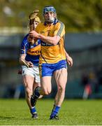 20 April 2014; David McInerney scores a point for Clare under pressure from Kieran Bergin, Tipperary. Allianz Hurling League Division 1 semi-final, Clare v Tipperary, Gaelic Grounds, Limerick. Picture credit: Ray McManus / SPORTSFILE