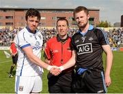 19 April 2014; Team captains Conor P. Moynagh, left, Cavan, and Jack McCaffrey, Dublin, shake hands in the company of referee Derek O'Mahoney. Cadbury GAA Football U21 Championship Semi-Final, Cavan v Dublin, O'Moore Park, Portlaoise, Co. Laois. Picture credit: Piaras Ó Mídheach / SPORTSFILE