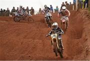 21 April 2014; Gary Gibson leads on the opening lap of the second Expert MX1 race of the day. Ulster Motocross Championship, Desertmartin Motocross Park, Co. Derry.  Picture credit: Ramsey Cardy / SPORTSFILE