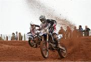 21 April 2014; Robert Hamilton leads Michael Mahon during the second Expert MX1 race. Ulster Motocross Championship, Desertmartin Motocross Park, Co. Derry.  Picture credit: Ramsey Cardy / SPORTSFILE