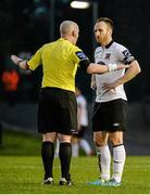 11 April 2014; Stephen O'Donnell, Dundalk, in conversation with referee Rob Rogers. Airtricity League Premier Division, UCD v Dundalk, The UCD Bowl, Belfield, Dublin. Picture credit: Piaras Ó Mídheach / SPORTSFILE