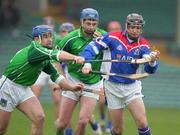 5 February 2006; Noel Gleeson, WIT, in action against Damien Reale, left, and Brian Geary, Limerick. Waterford Crystal Cup Final, Limerick v WIT, Gaelic Grounds, Limerick. Picture credit: Kieran Clancy / SPORTSFILE