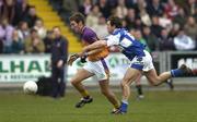 5 February 2006; Redmond Barry, Wexford, in action against Chris Conway, Laois. Allianz National Football League, Division 1B, Round 1, Laois v Wexford, O'Moore Park, Portlaoise, Co. Laois. Picture credit: Brian Lawless / SPORTSFILE