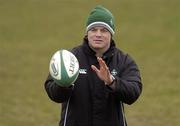 7 February 2006; Brian O'Driscoll, who took no part in Ireland rugby squad training, practices his ball skills while his team-mates train. St. Gerard's School, Bray, Co. Wicklow. Picture credit; Pat Murphy / SPORTSFILE