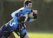 8 February 2006; Kian Ward, DIT, in action against Peter Donnelly, UUJ. Datapac Sigerson Cup, Second Round, DIT v UUJ, St. Brendan's Hospital, Grangegorman, Dublin. Picture credit; Pat Murphy / SPORTSFILE