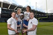 25 April 2014; Former Dublin Footballer Tomás Quinn, left, and Monaghan's Colin Walshe holding the Dan Rooney trophy with cheerleaders Emma Reynolds, left, and Holly Collis Lee visit Croke Park to meet up with members of the University of Central Florida and Penn State University as both colleges finalise their plans for the Croke Park Classic which takes place in GAA HQ on August 30th. Tickets for the Croke Park Classic are on sale now from www.ticketmaster.ie and www.tickets.ie. For further information, check out www.crokeparkclassic.ie. Croke Park Classic April Visit and Media Day, Croke Park, Dublin. Picture credit: David Maher / SPORTSFILE