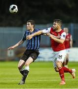 25 April 2014; Mark Hughes, Athlone Town, in action against James Chambers, St Patrick's Athletic. Airtricity League Premier Division, St Patrick's Athletic v Athlone Town, Richmond Park, Dublin. Picture credit: David Maher / SPORTSFILE