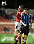 25 April 2014; Sean Hoare, St Patrick's Athletic, in action against Mark Hughes, Athlone Town. Airtricity League Premier Division, St Patrick's Athletic v Athlone Town, Richmond Park, Dublin. Picture credit: David Maher / SPORTSFILE