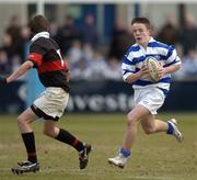 9 February 2006; Liam McHugh, Blackrock College, is tackled by Ian Lane, High School. Leinster Schools Junior Cup, High School v Blackrock College, Donnybrook, Dublin. Picture credit; Damien Eagers / SPORTSFILE