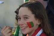 20 November 2005; St Brigids supporter Nicole Nestor has her face painted before the game. AIB Connacht Club Senior Football Championship Final, Salthill-Knocknacarra v St. Brigids, Pearse Stadium, Galway. Picture credit: Damien Eagers / SPORTSFILE