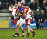 12 February 2006; Derry players Francis McEldowney and Joseph O'Kane tussle with Wexford's Matty Ford. Francis McEldowney was subsequently sent off. Allianz National Football League, Division 1B, Round 2, Wexford v Derry, Wexford Park, Wexford. Picture credit: Matt Browne / SPORTSFILE