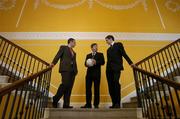 13 February 2006; At a photocall ahead of the AIB All-Ireland Club Football Championship semi-finals, were, from left, Ciaran Kelleher, Kilmacud Crokes, Billy Finn, General Manager, AIB, and Maurice Sheridan, Salthill-Knocknacarra. Ely Place, Dublin. Picture credit; Brendan Moran / SPORTSFILE