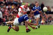 20 June 1999; Geoffrey McGonagle of Derry in action against Gavin Hartin of Cavan during the Bank of Ireland Ulster Senior Football Championship quarter-final match between Derry and Cavan at Casement Park in Belfast. Photo by David Maher/Sportsfile